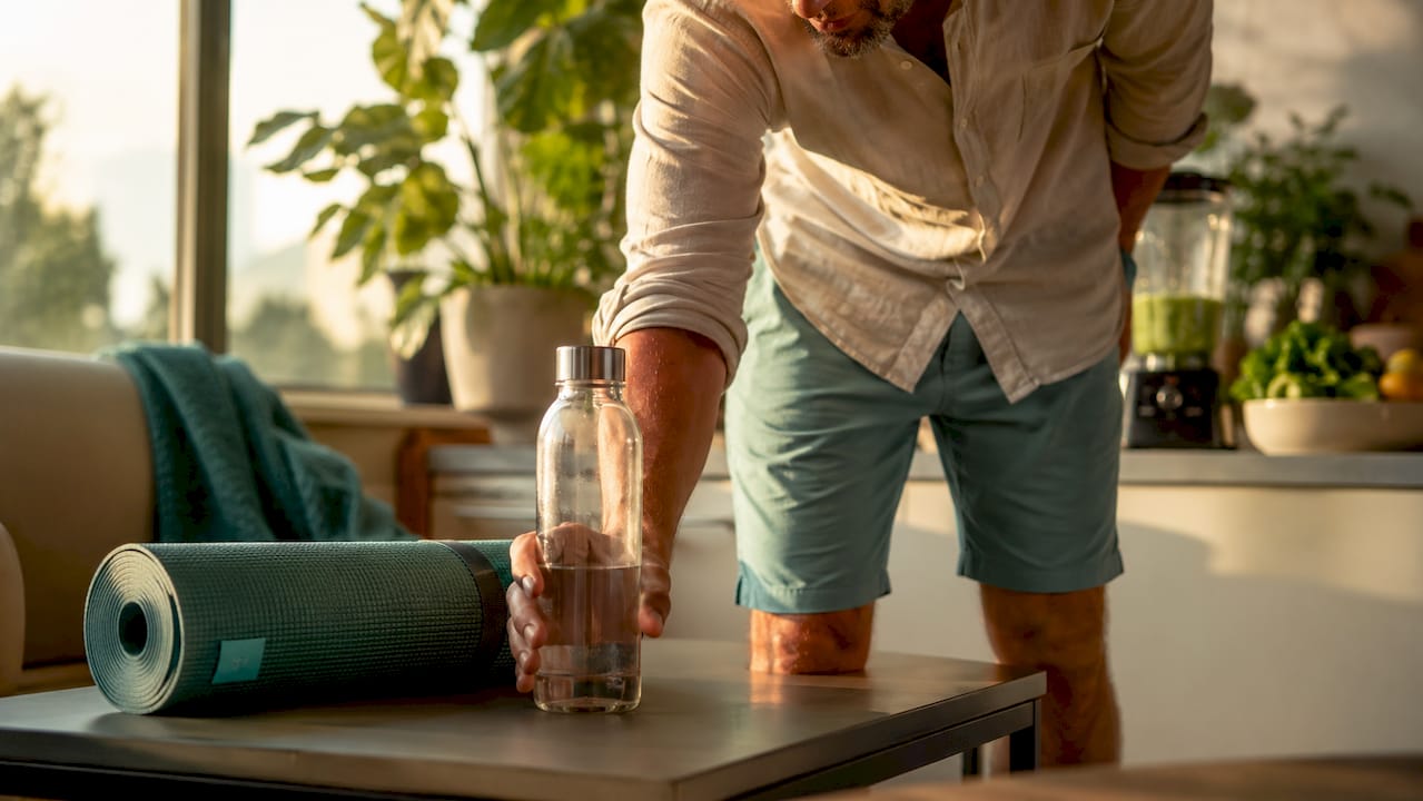 Self Care Practices for a Healthier Mind and Body 2 Man preparing morning self care routine