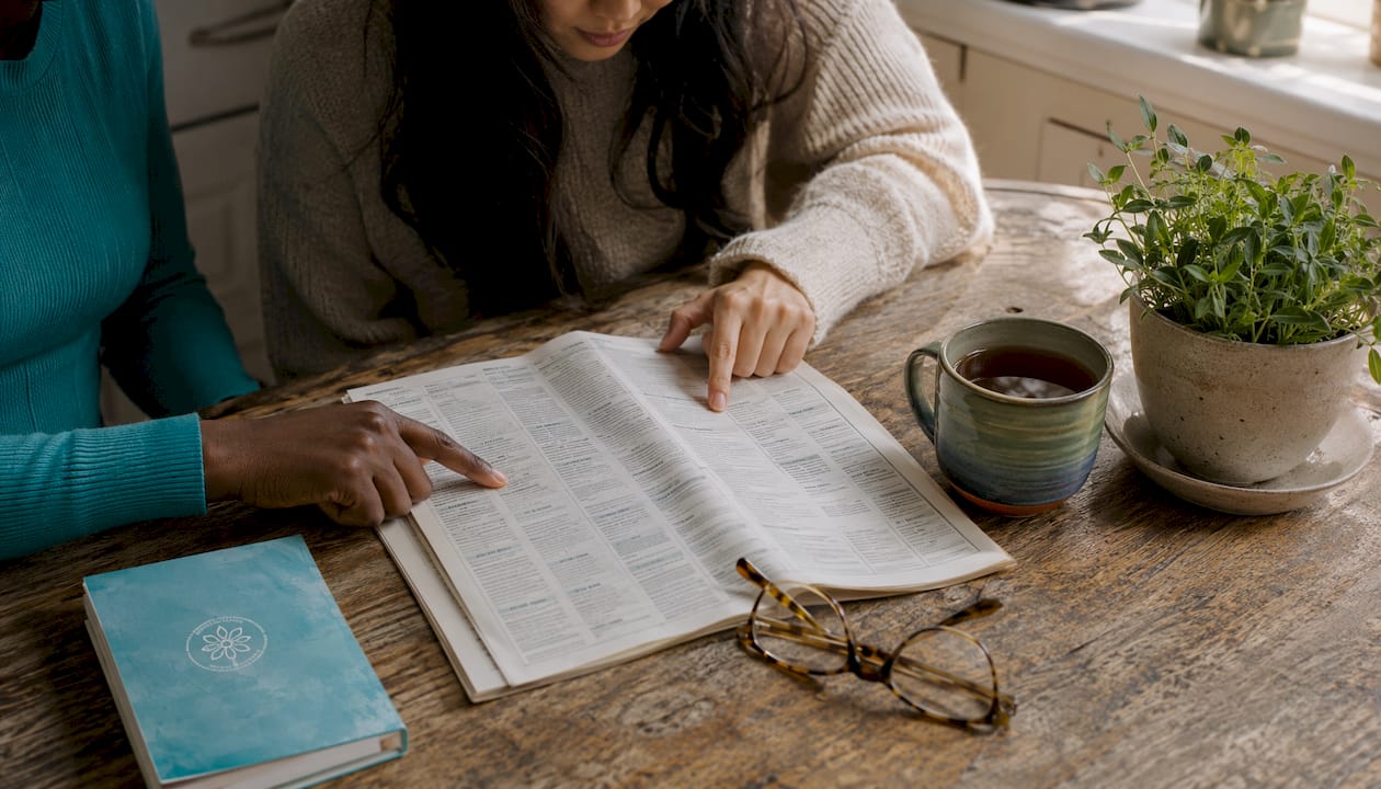 Best WilcoxHealingCenter.com Alternatives for Mind-Body-Soul Healing 1 Hands browsing holistic healing directory