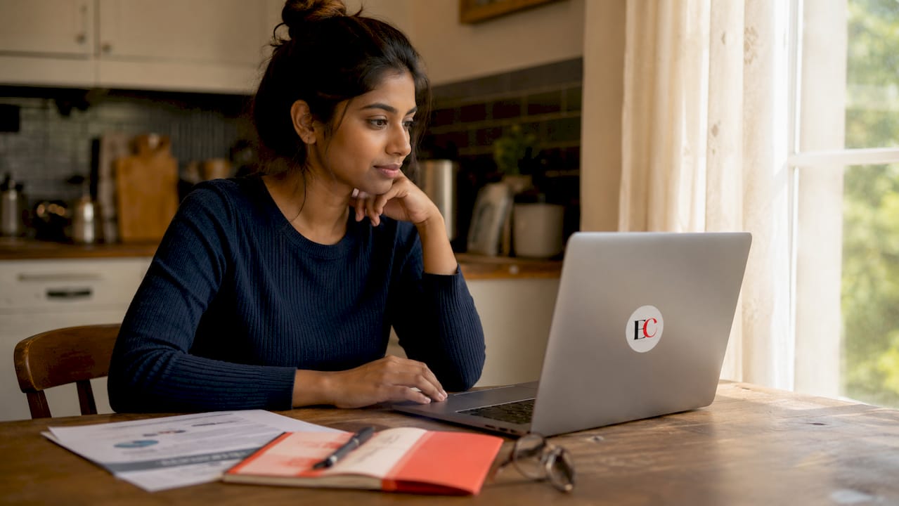 Singapore credit counselling explained: your 2026 guide 2 Overhead view of hands on laptop during webinar