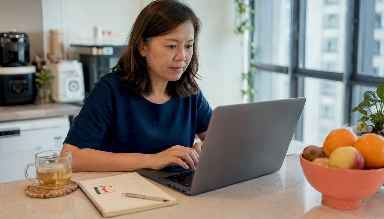 CDC voucher benefits for Singapore households: 2026 guide 2 Woman claiming CDC vouchers on tablet