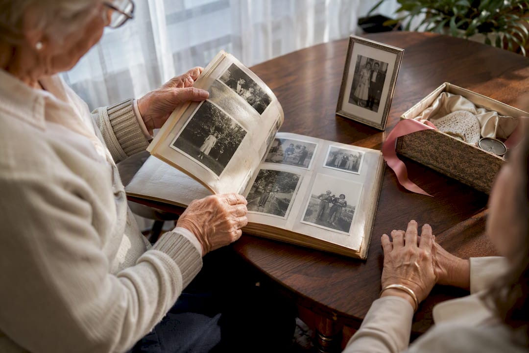 Senior reviewing memories in photo album
