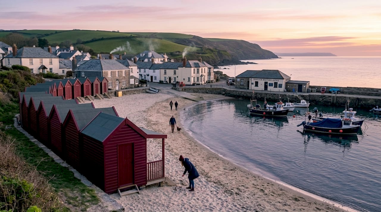 Scenic Devon coastline with beach and harbour village