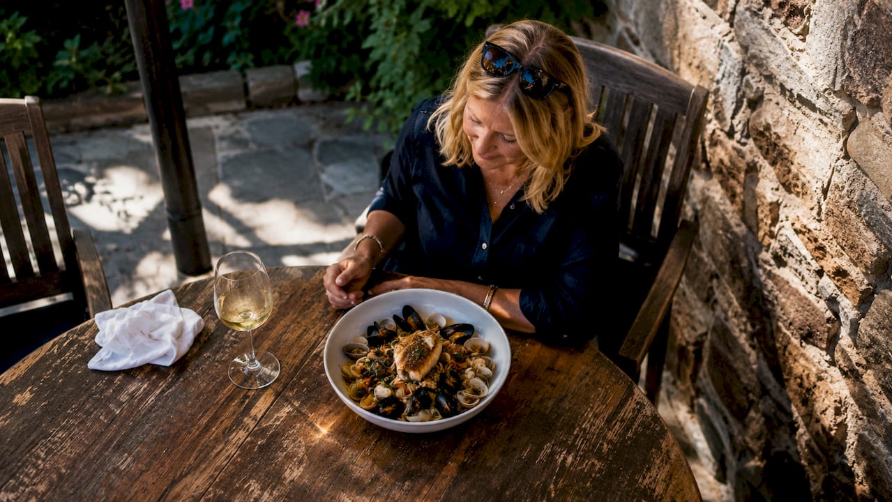 Woman dining at Dartmouth local restaurant