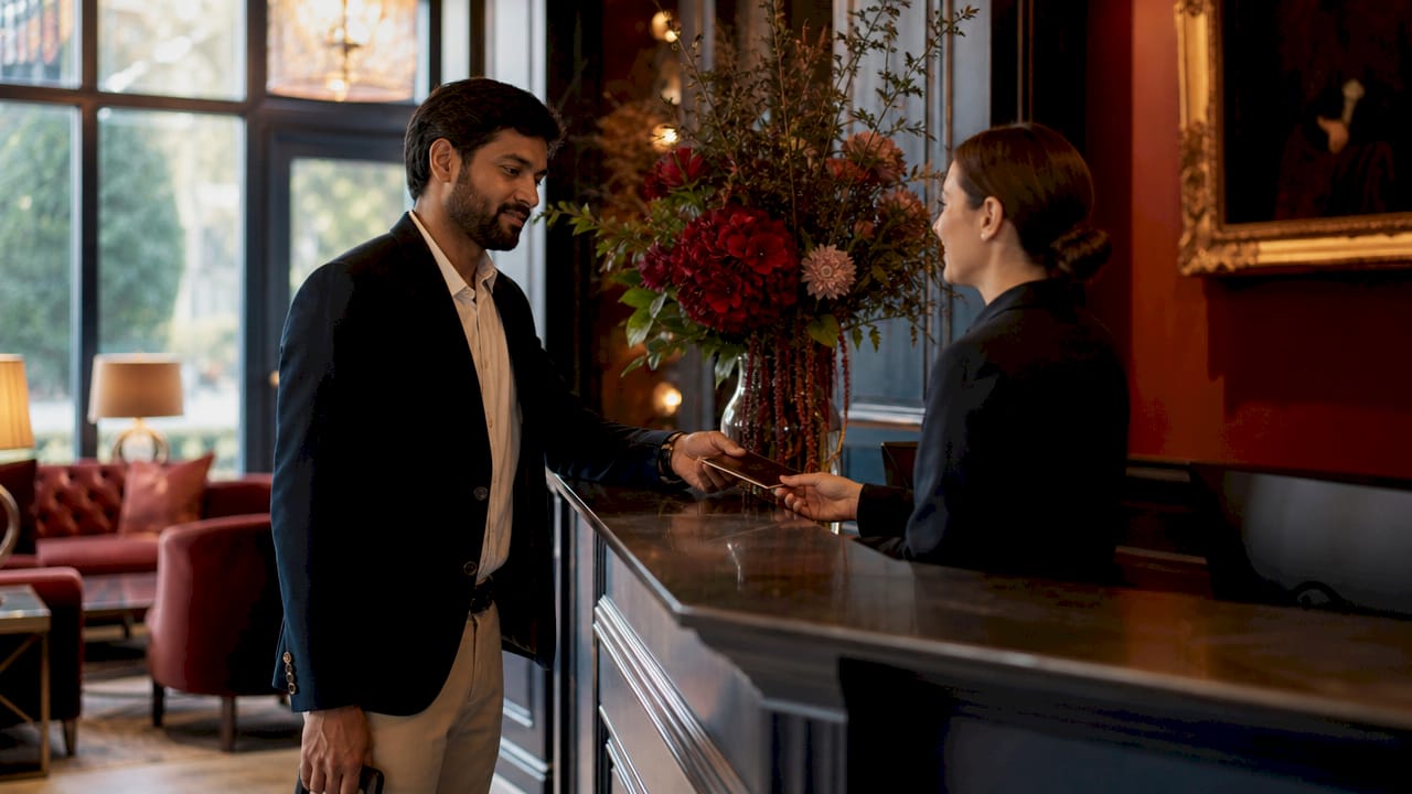 Guest checking in at Bovey Castle front desk