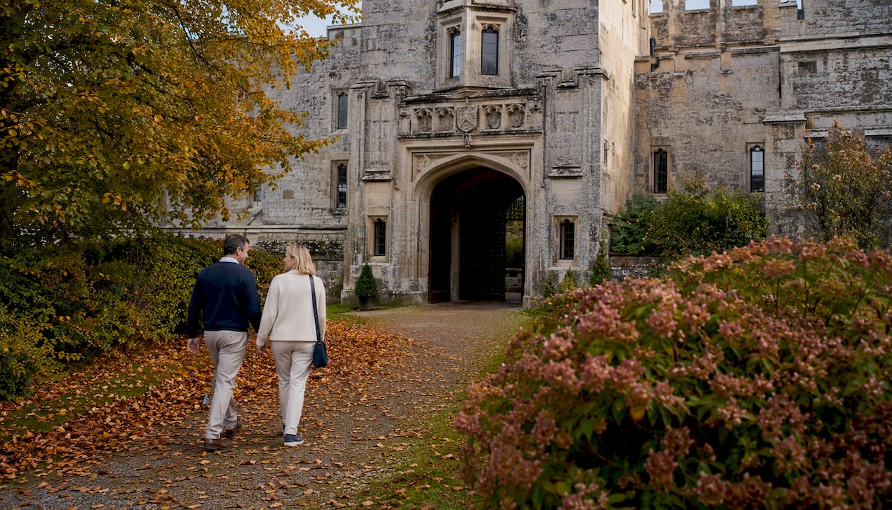 Visitors approaching Castle Drogo entrance outdoors