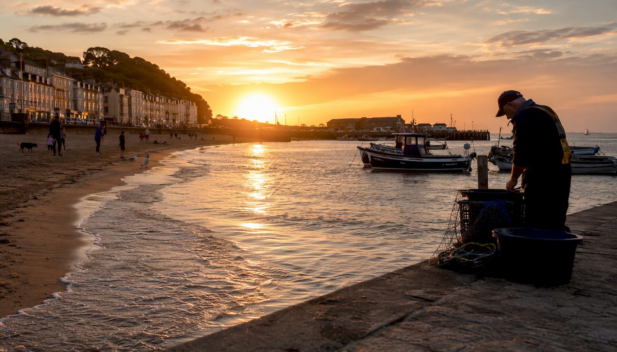 Teignmouth estuary seafront view with boats and beach
