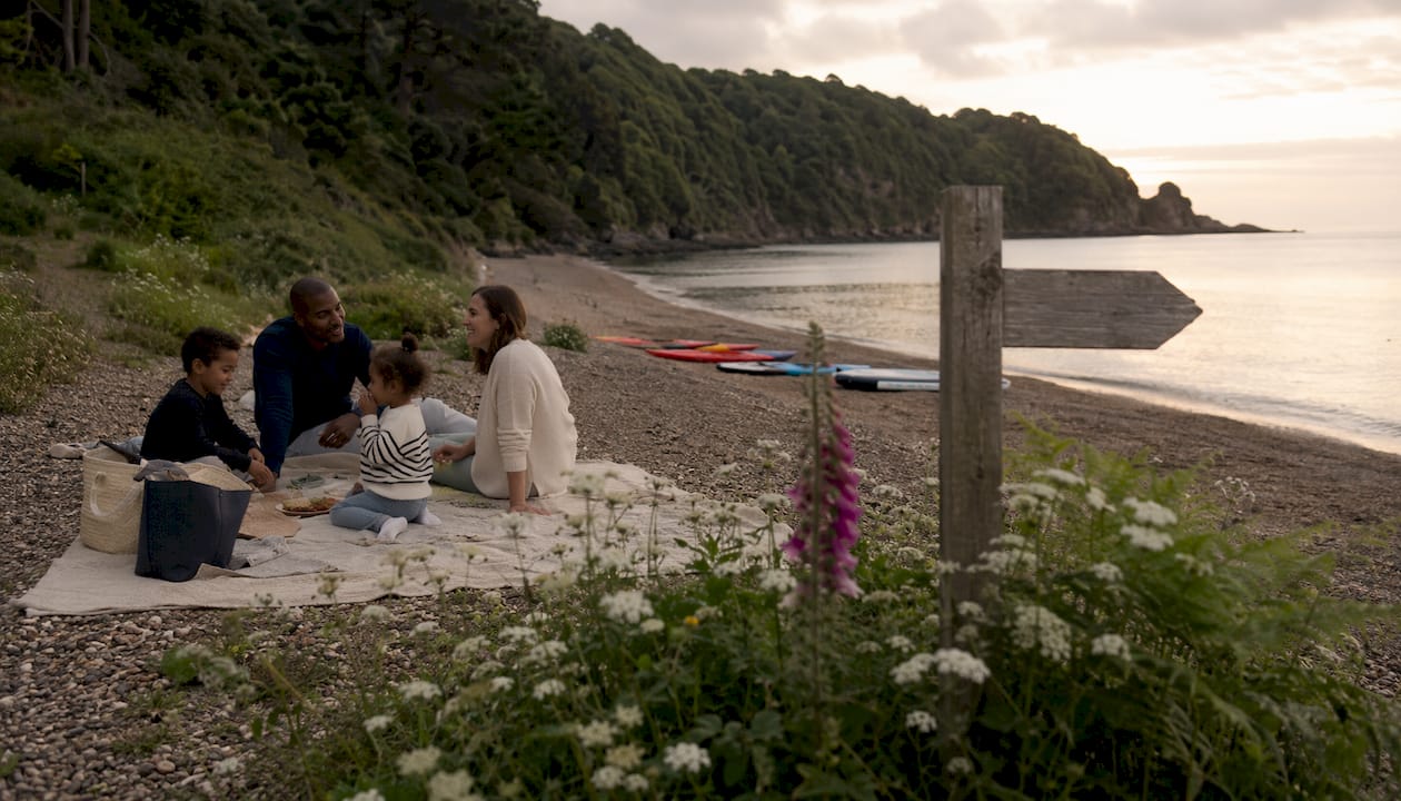 Wide view of Blackpool Sands beach and sea