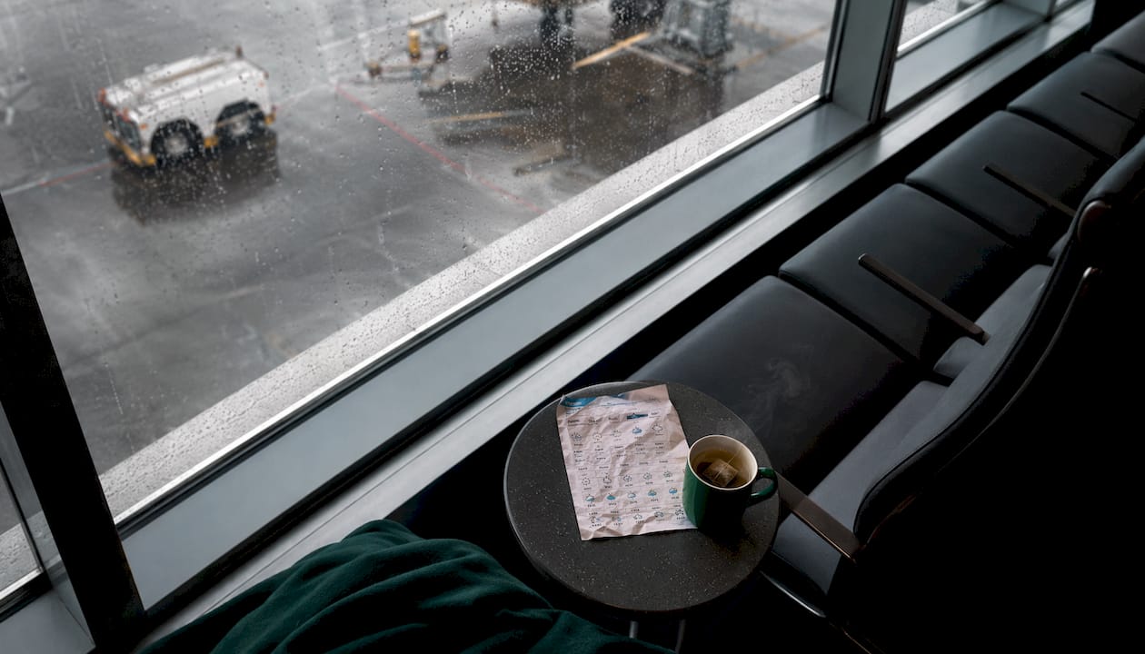 Rainy airport gate illustrating delays