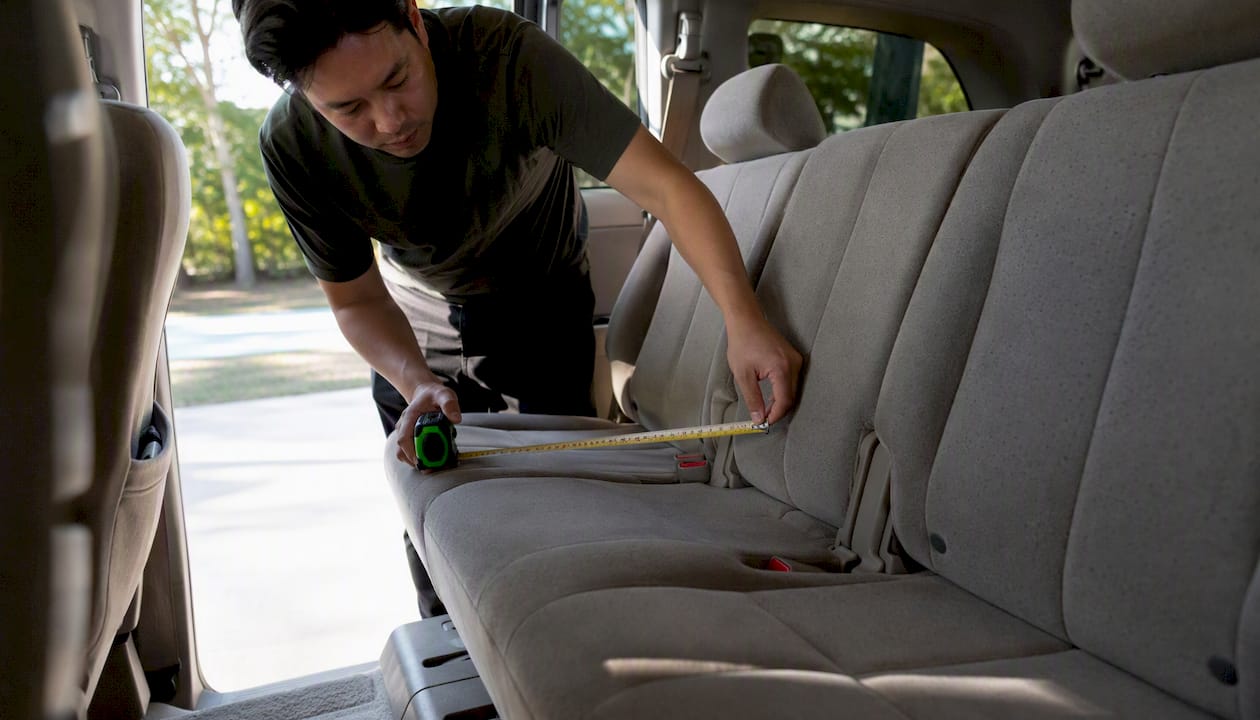 Measuring seat width inside vehicle for car seat