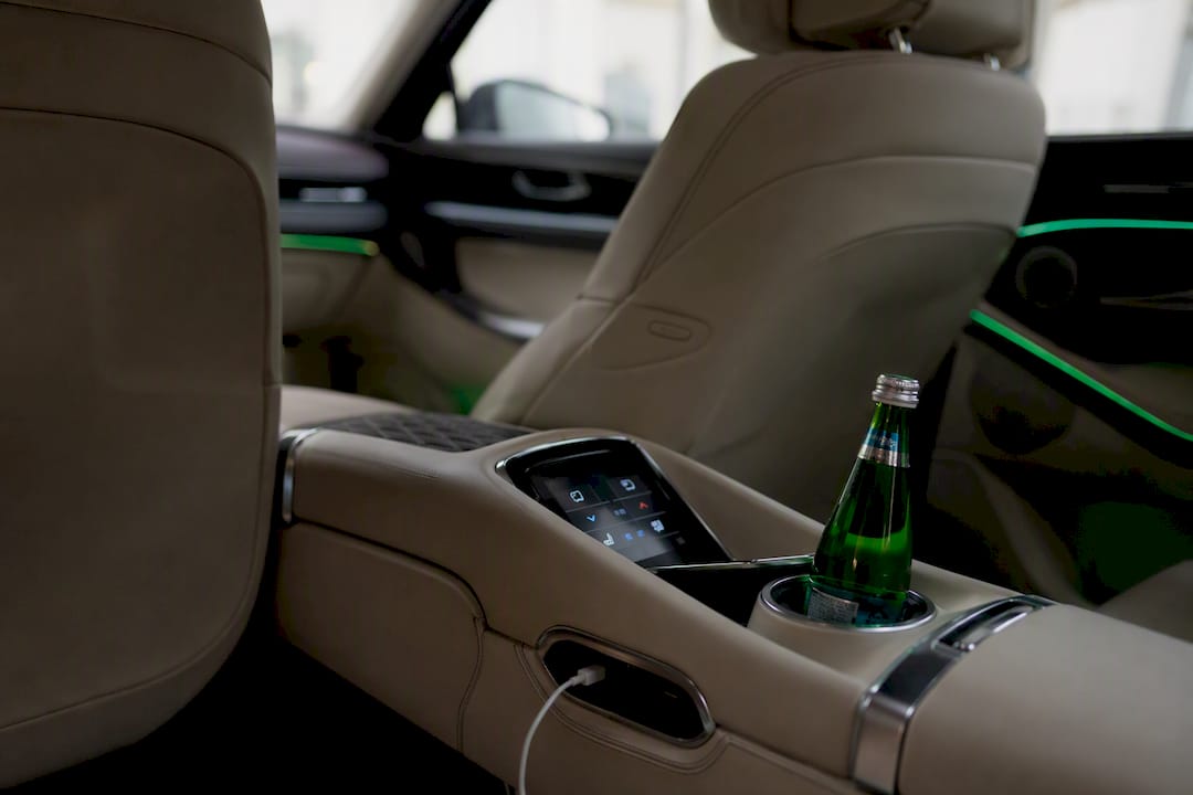Luxury vehicle interior with amenities details
