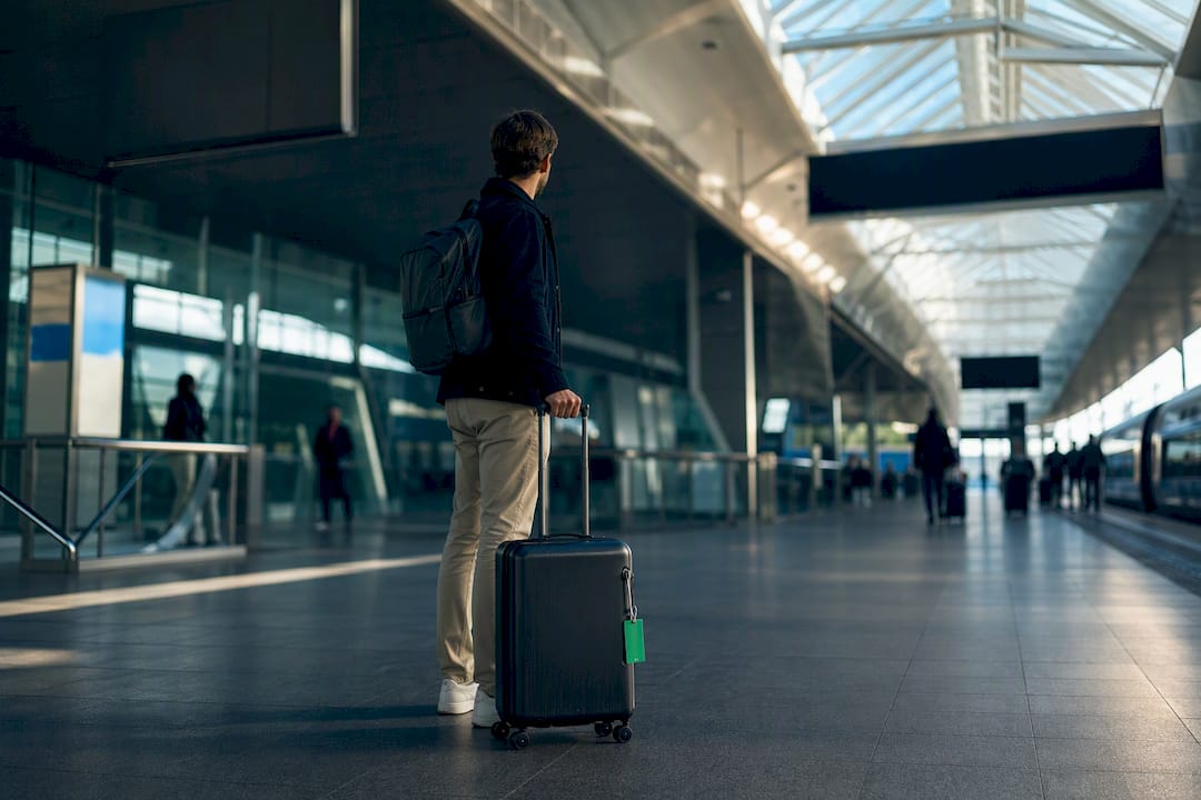 Traveler navigating Lyon airport transport connections