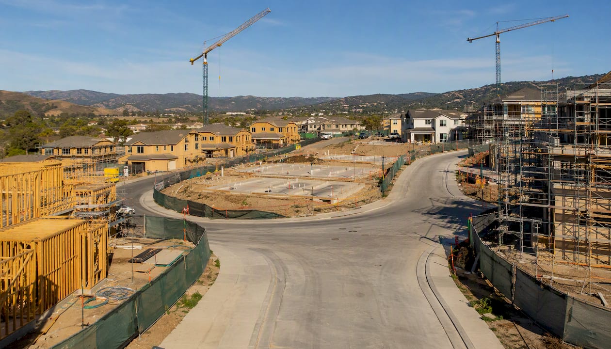 Developing residential street with infrastructure under construction