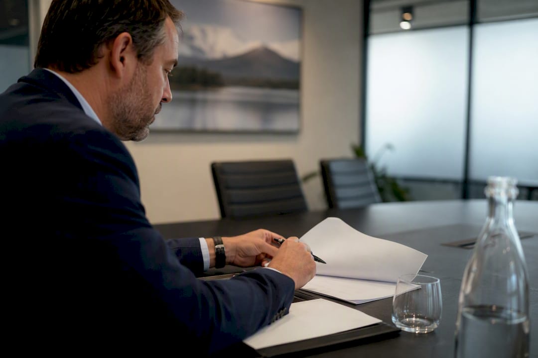 Executive hands reviewing franchise report