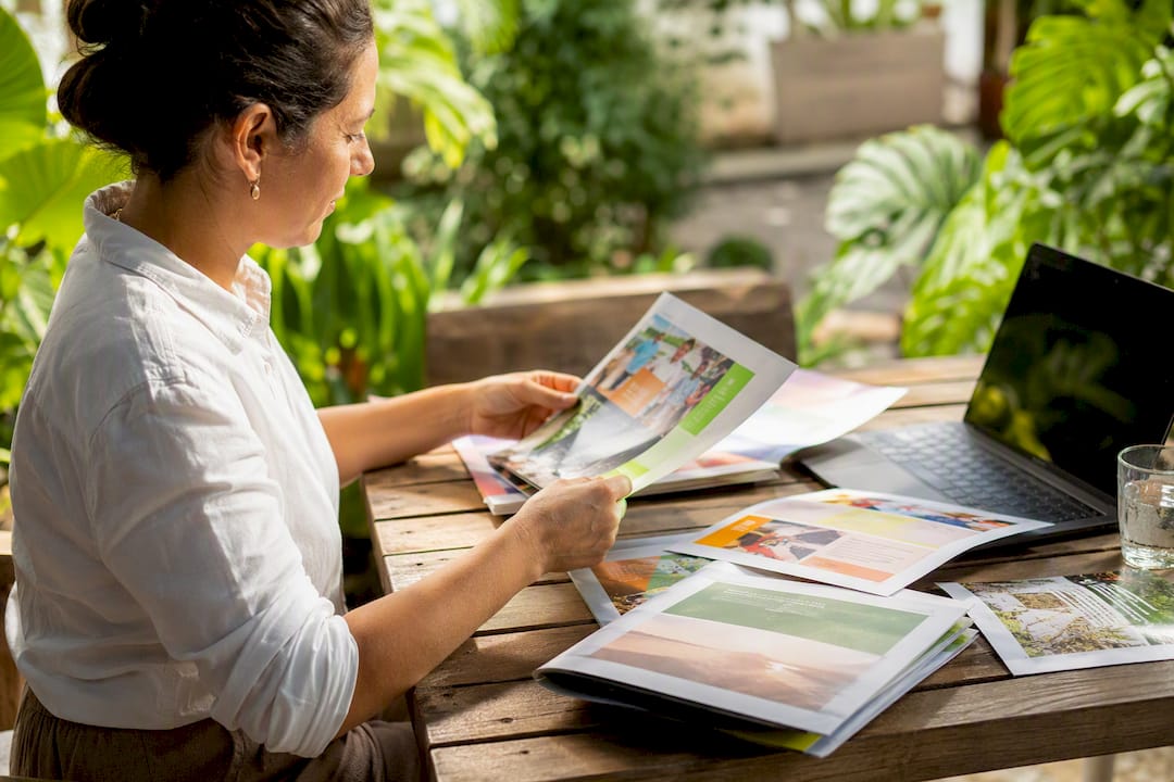 Hands selecting marketing content materials
