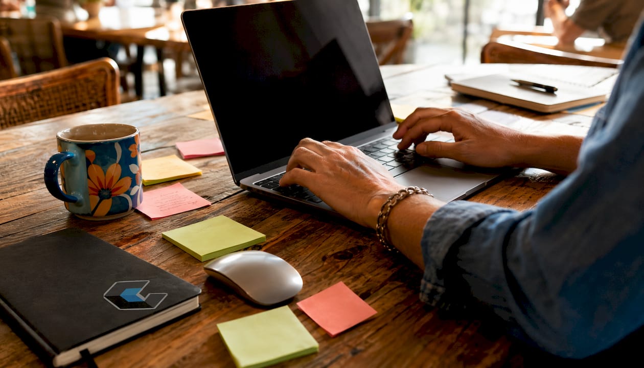 Close-up hands managing enterprise prospecting data