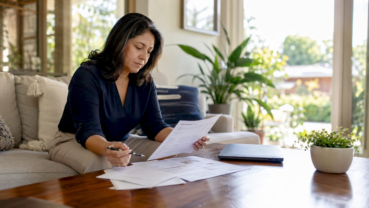 Homeowner reviewing solar savings documents