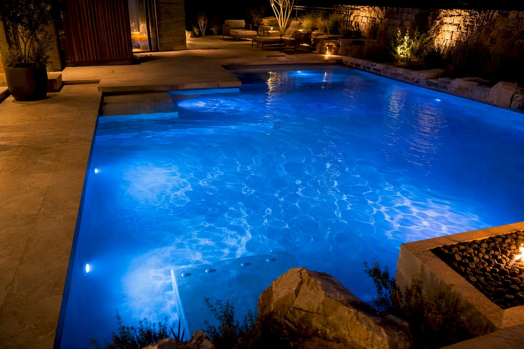 Bright LED lighting illuminating luxury pool