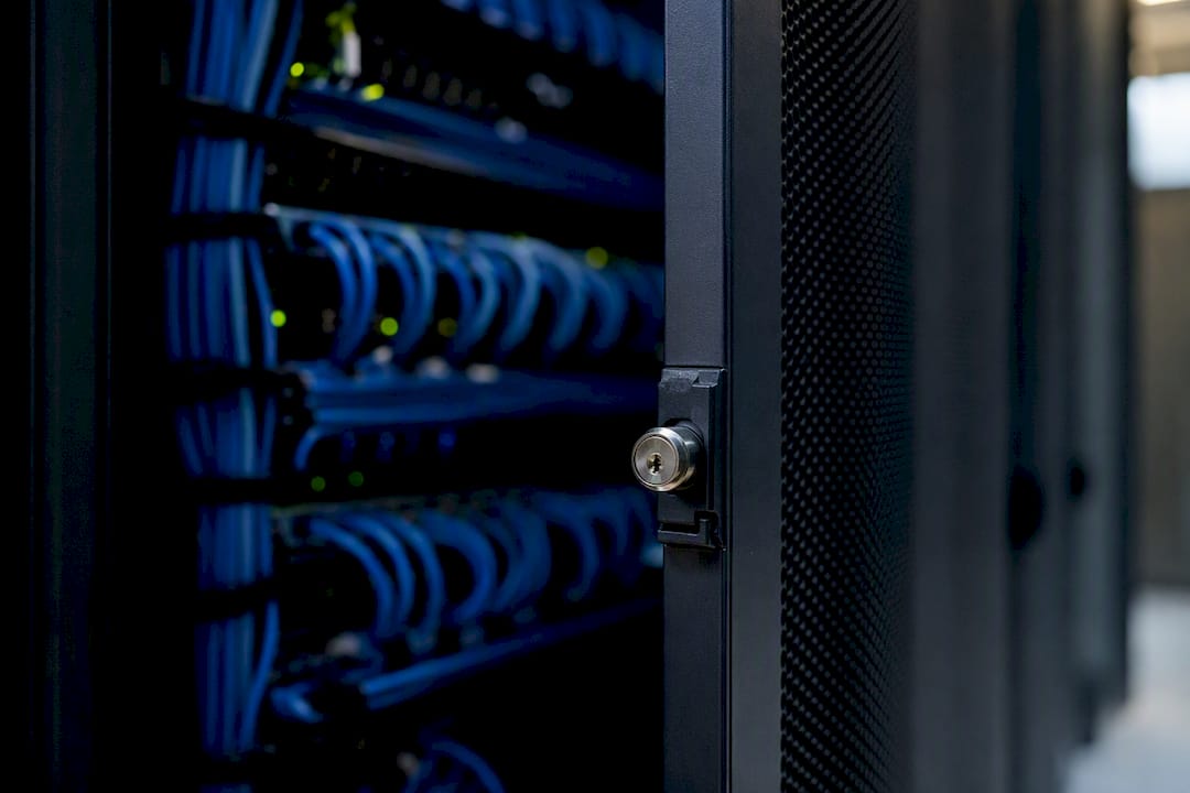 Close-up of locked server rack cables