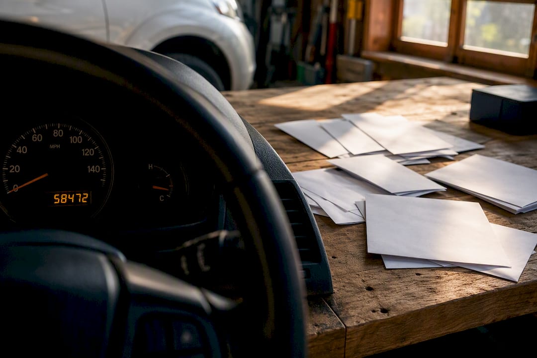 Used car odometer with repair documents