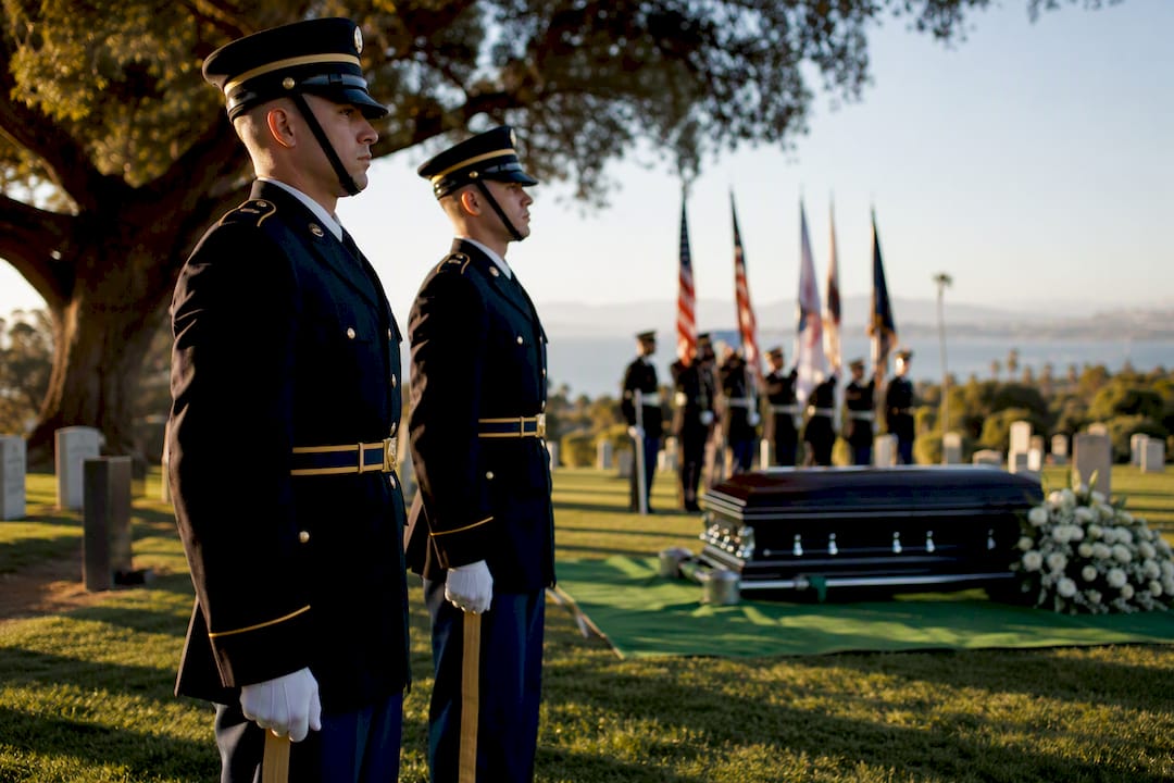 Service members at a graveside honors ceremony