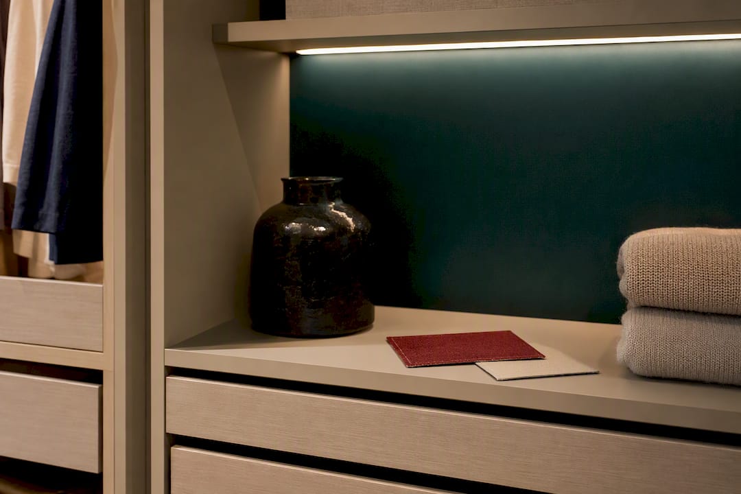 Two-tone closet wall and shelving finishes