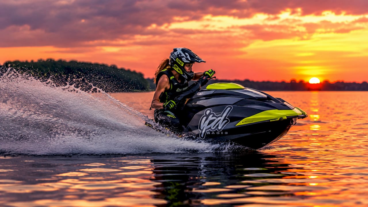 Jet ski racer turning showing trim effect on water