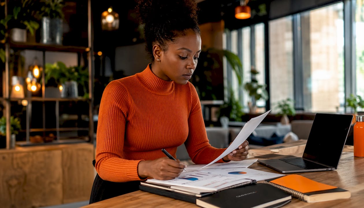 Marketing strategist reviewing AI campaign data