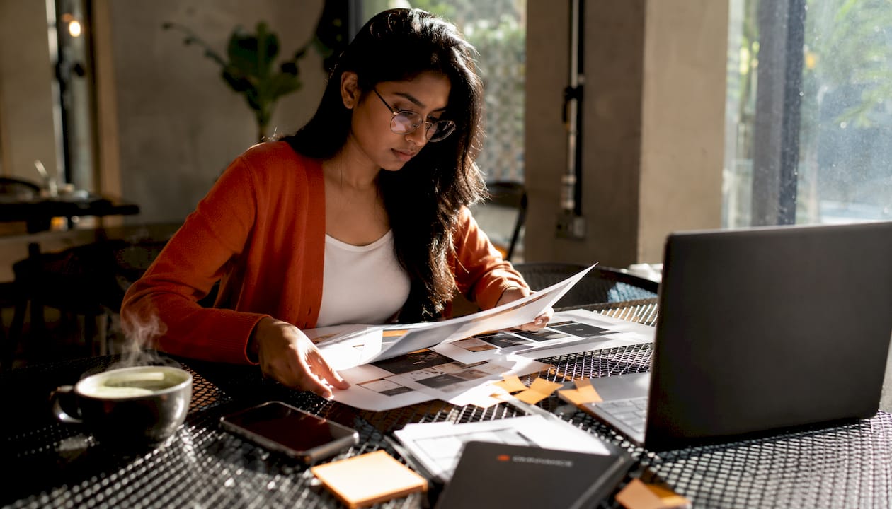 Woman arranging e-commerce advertising plans