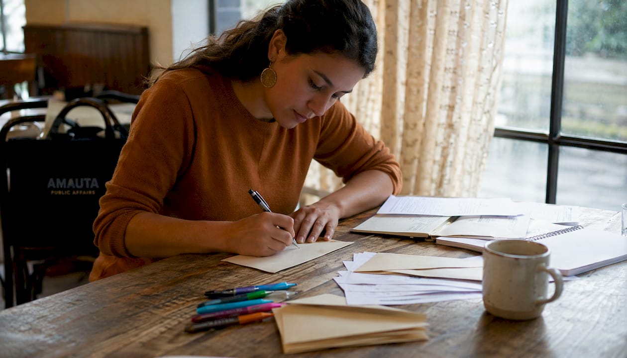 Nonprofit worker preparing personalized donor mails