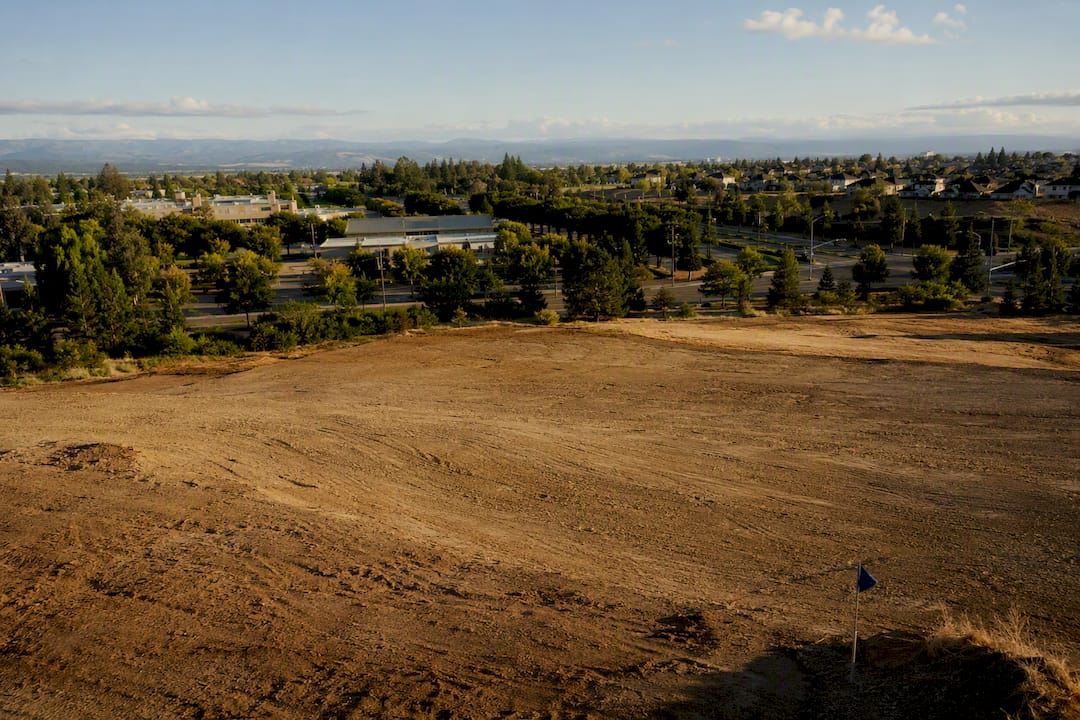 Development site beside established neighborhood