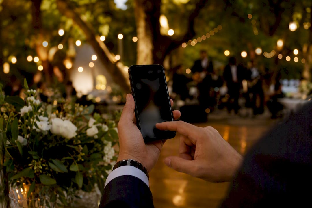 Hands recording voice memo on phone