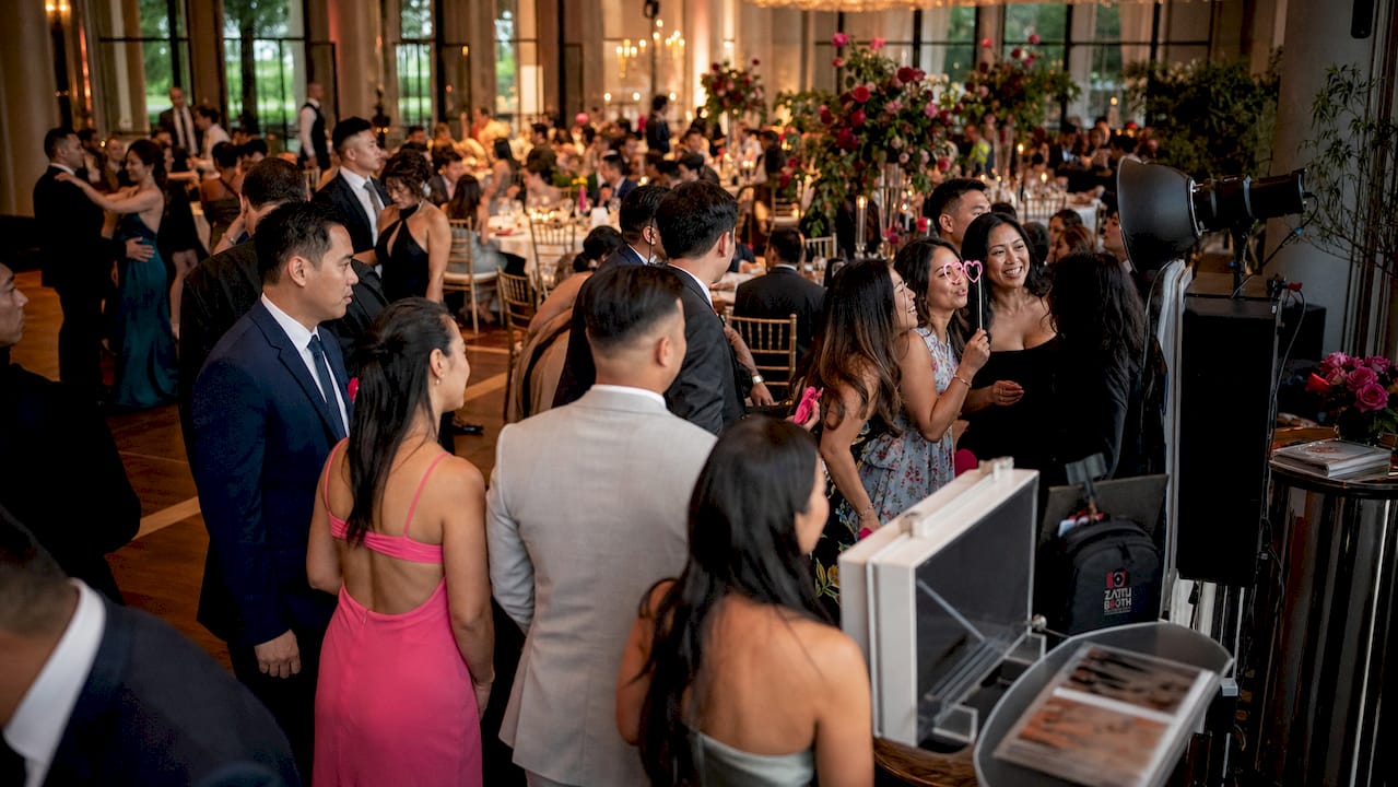 Crowded photo booth causing event congestion