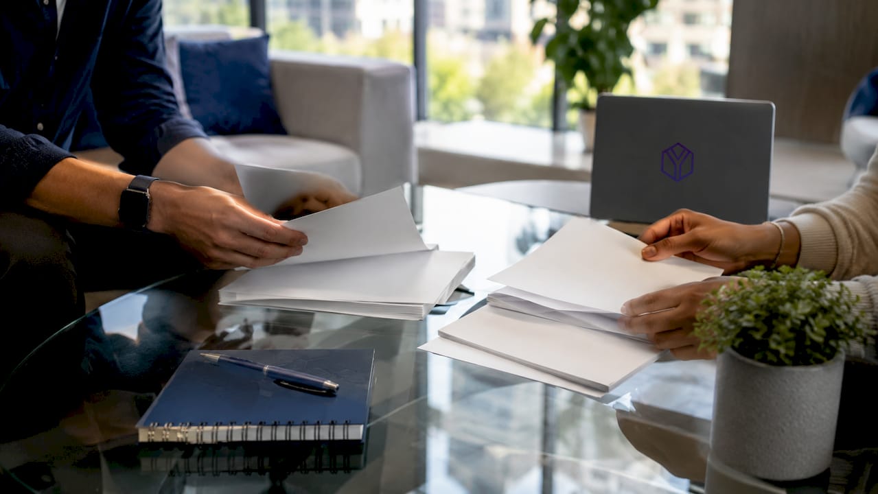 Overhead view of confidential documents on desk