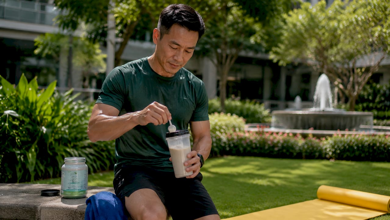 Man mixing collagen supplement post workout