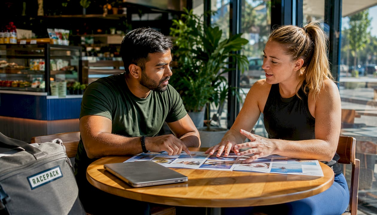 Two professionals discussing supplement certifications