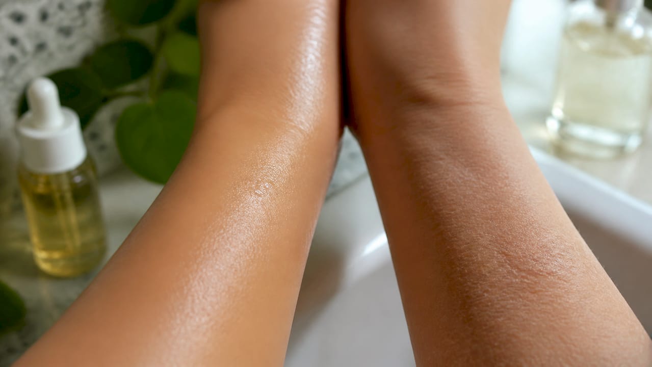 Close-up comparison of oily vs dry skin texture