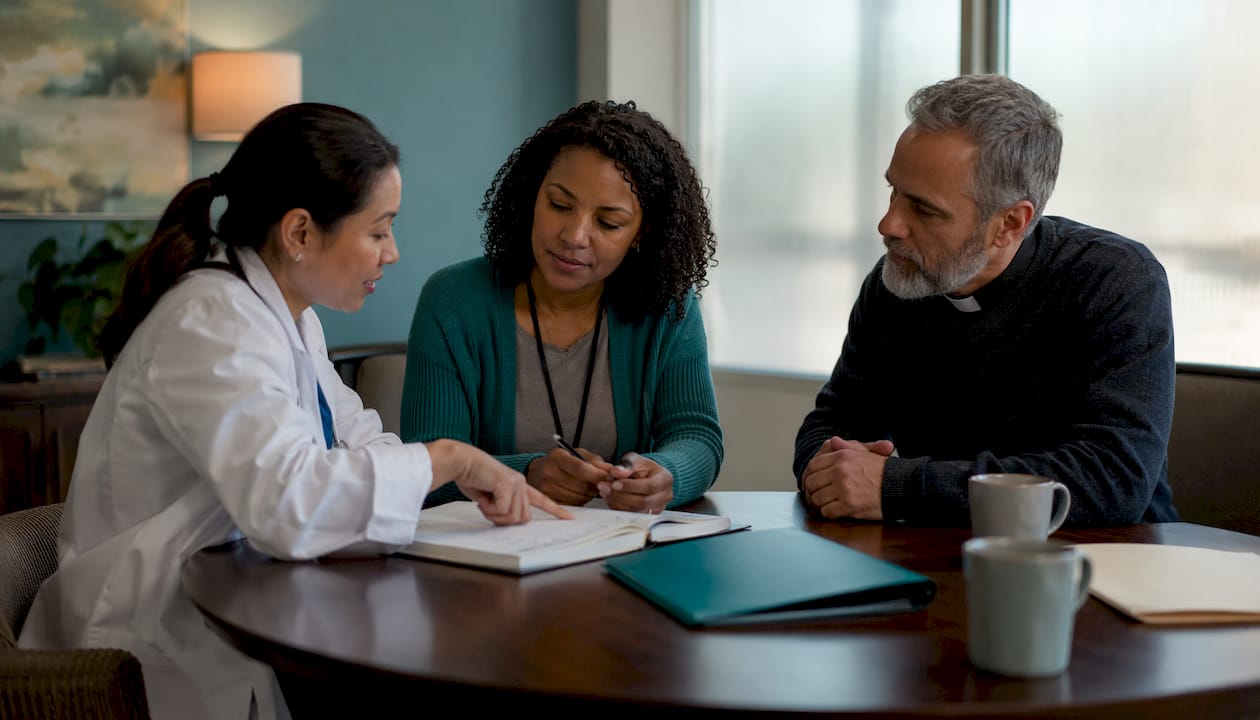 Healthcare team collaborating in meeting room
