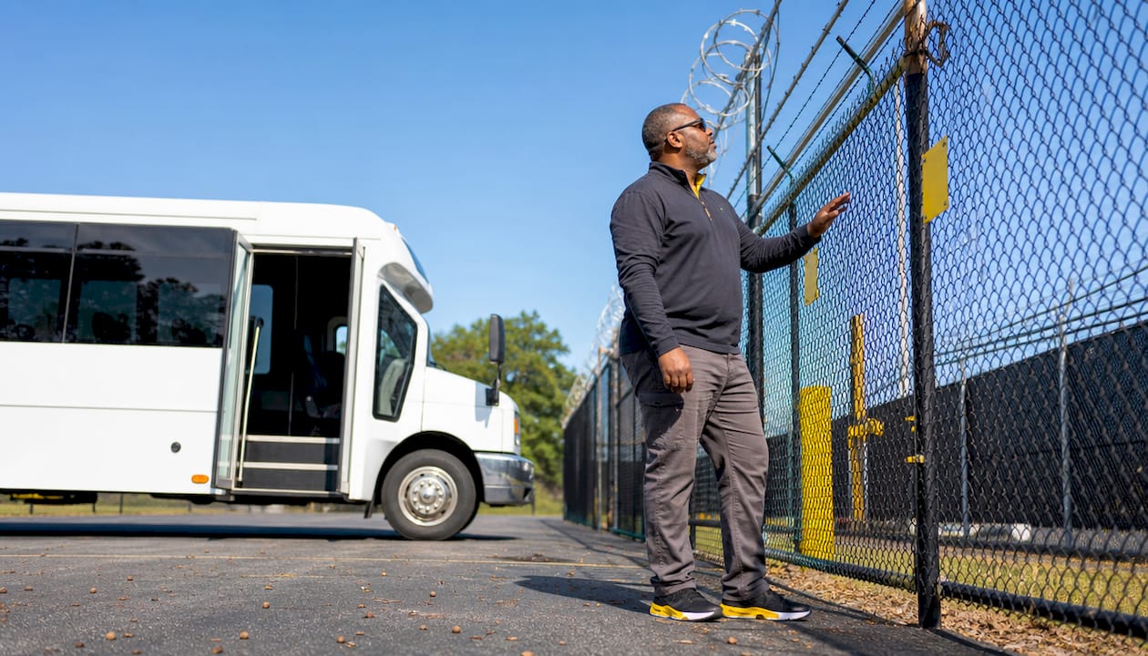 Man inspecting secure cruise parking perimeter