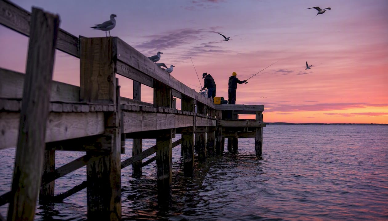 Fisherman on Ocean View Pier at sunset