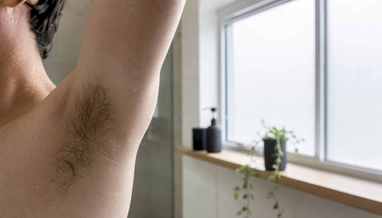 Close-up of damp underarm hair and skin