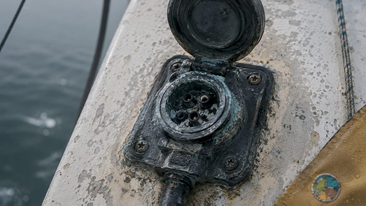Close-up of corroded marine electrical connector