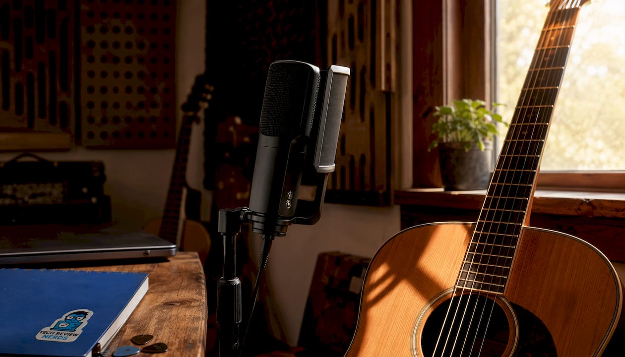 Condenser microphone capturing acoustic guitar sound