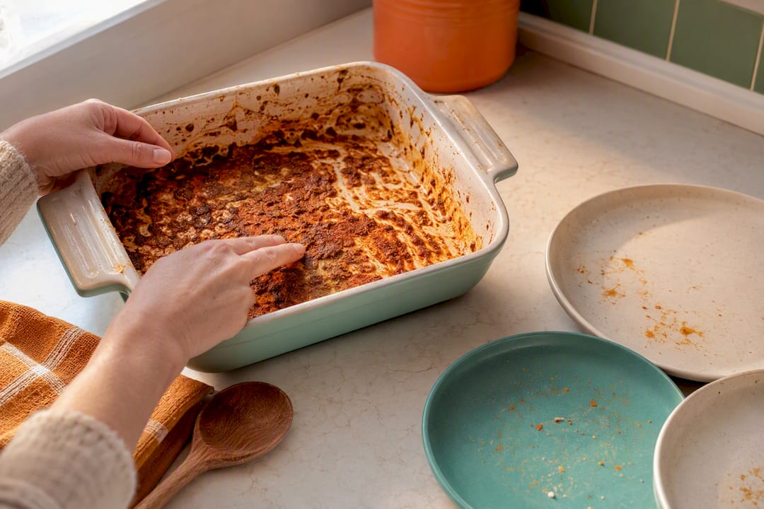 Baking dish showing stubborn dried-on residue