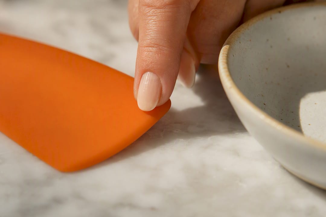 Fingernail checking silicone utensil surface