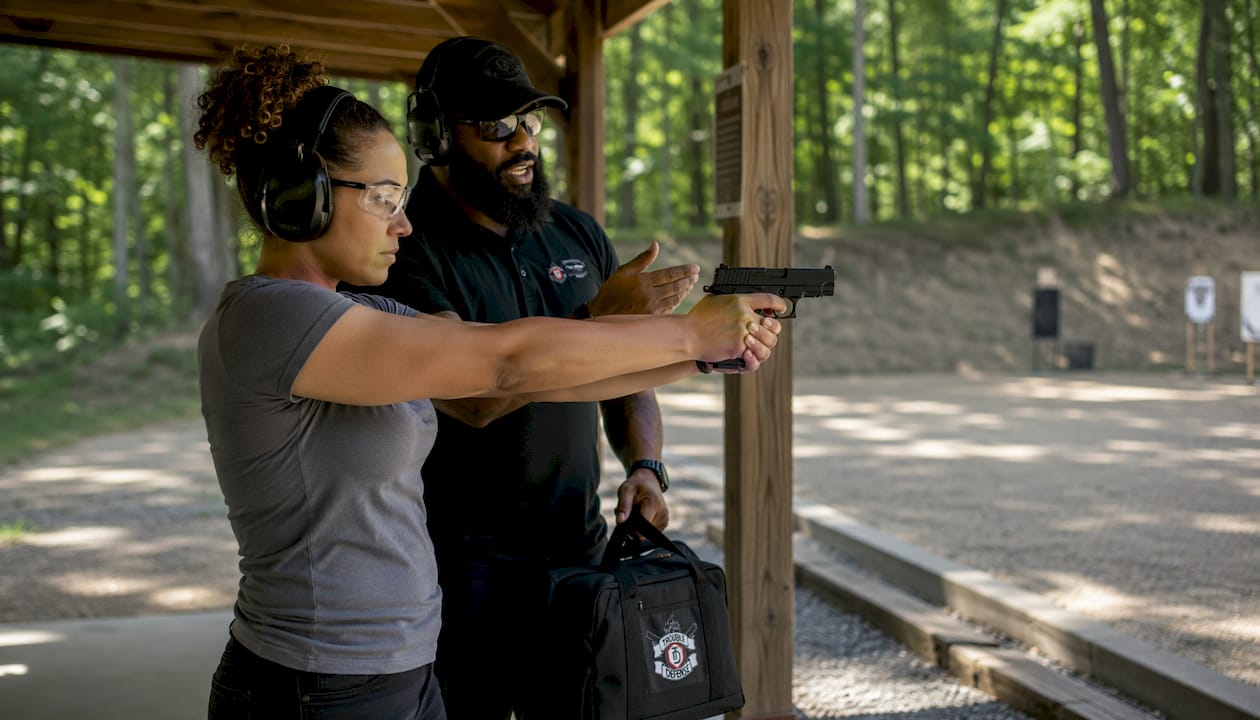Woman training safely at a shooting range