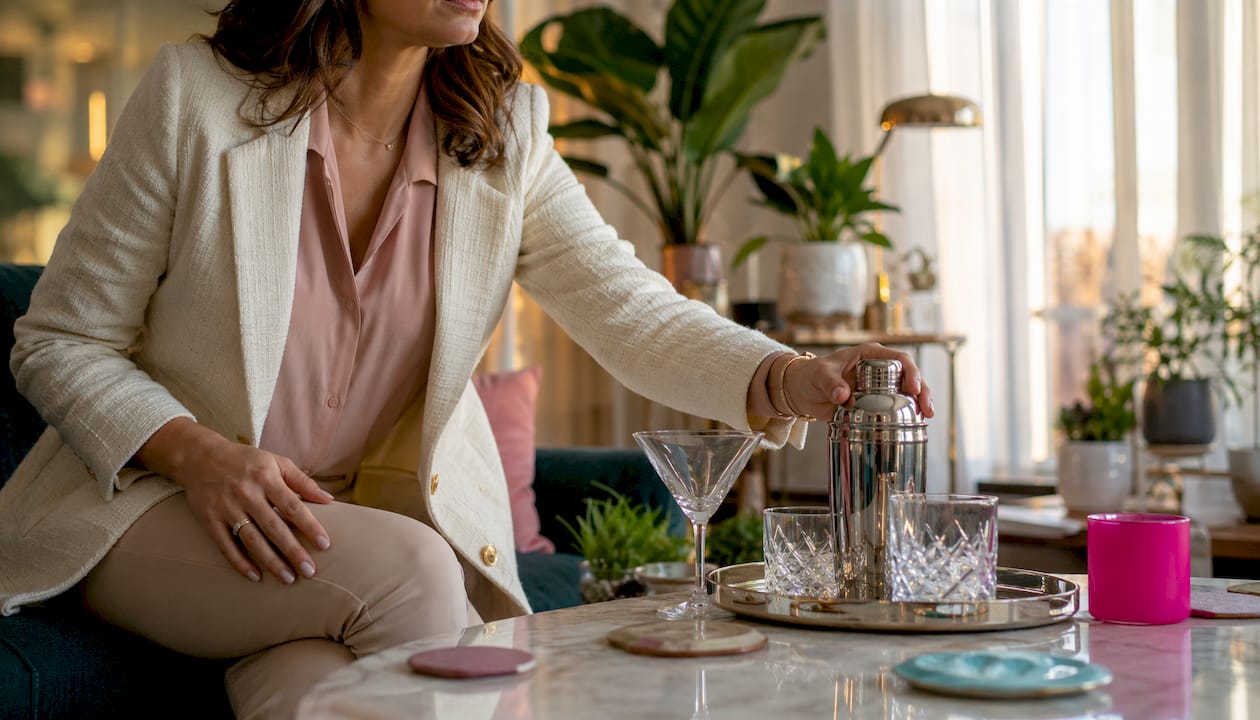 Close-up layered cocktail outfit details with accessories