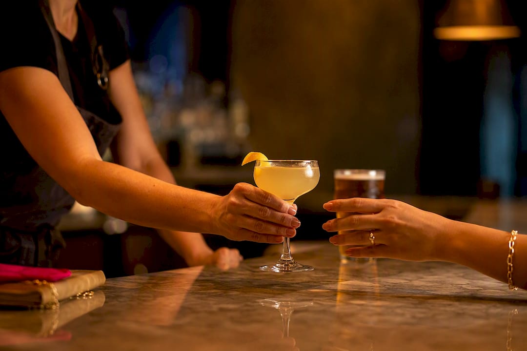 House cocktail served at neighborhood bar
