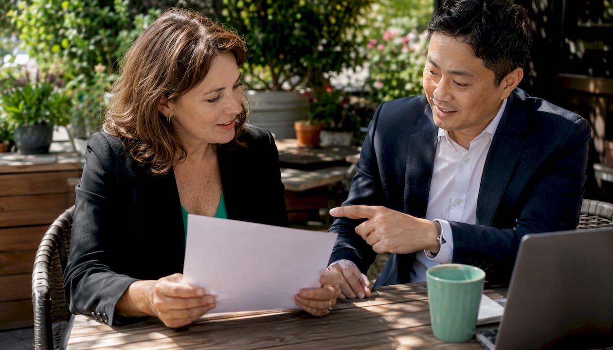 Mortgage broker explaining credit score to client