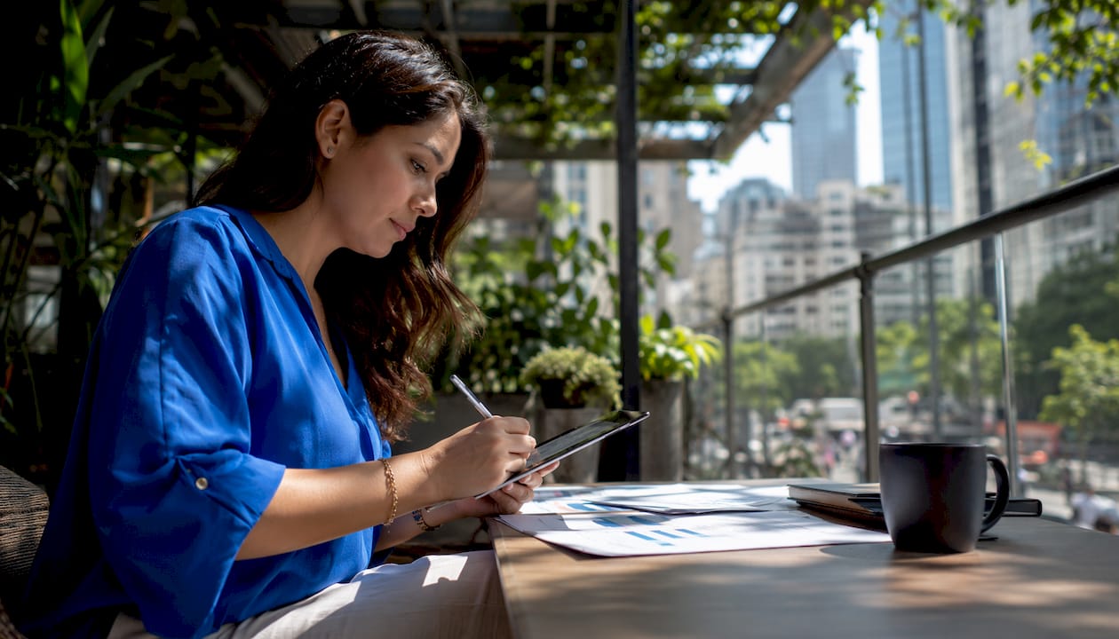 Woman analyzing social media A/B test reports
