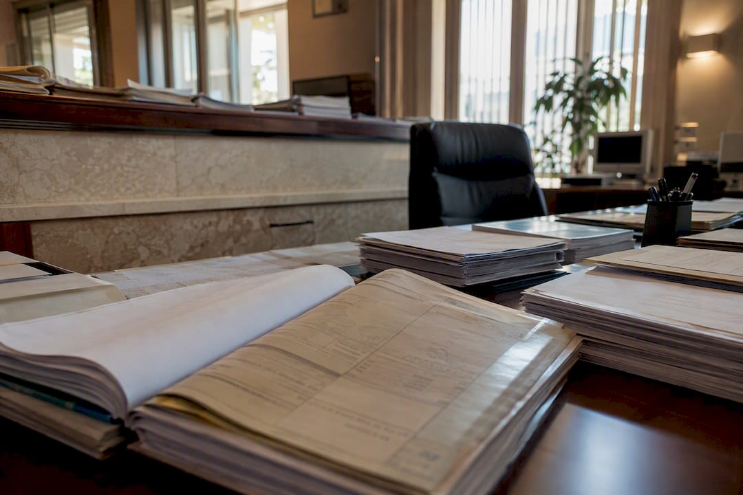 Tabu office counter with property registration documents